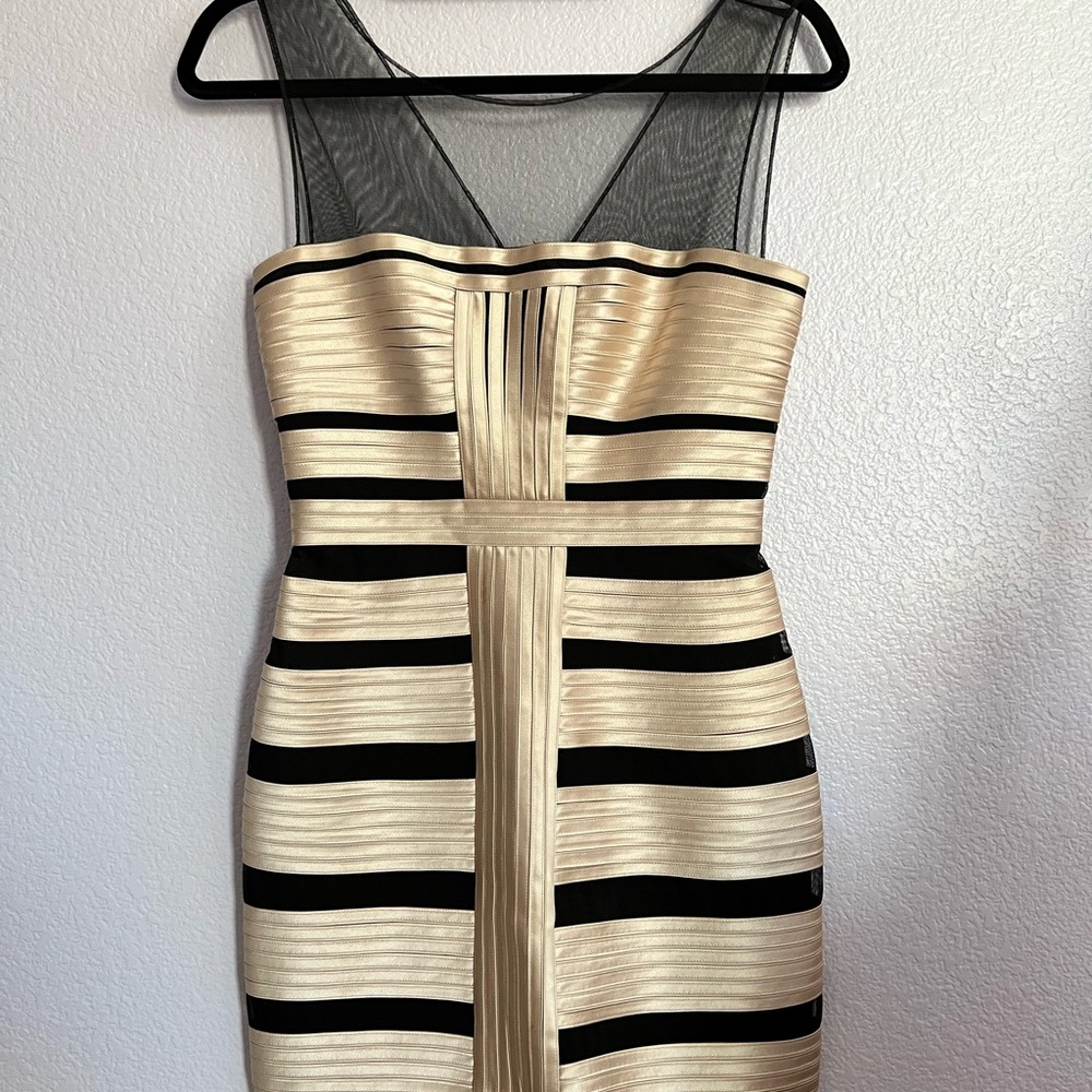 Bcbg beautiful, like new condition mini dress. Wore one. Stretchy fabric.